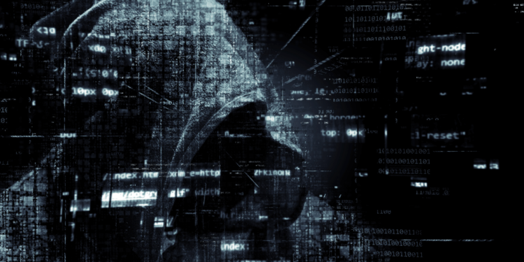 hacker performing a 51% attack on a blockchain